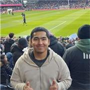 Football coach teach basic technics for young players for effective playing and feeling confident during the game