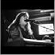 Vocal coach available for in-person or remote singing lessons & voice work