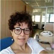 Docente universitaria di informatica e intelligenza artificiale, con dottorato e esperienza internazionale, offre lezioni online.