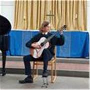 Guitar and violin teacher for all ages and levels