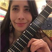 Online Guitar Lessons in Rock, Jazz, Blues, Folk, Latin, and Pop with a Fun, Creative Teacher - All Levels welcome!