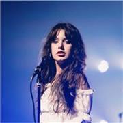 Supportive, technique-focused singing lessons for adults with a professional performer and trained vocalist