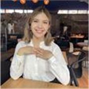 Native English speaker with CELTA certification, offering English lessons for adults.