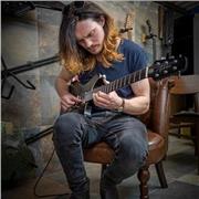 Guitar tutor offering lessons to inspire and educate