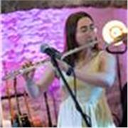 Music tutor providing lessons in piano and flute