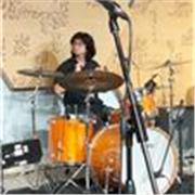 Profesor de música, batería y composición