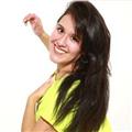 Instructora oficial de zumba fitness que imparte clases al aire libre