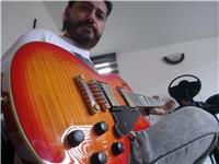 Clases de guitarra electrica, acústica y piano