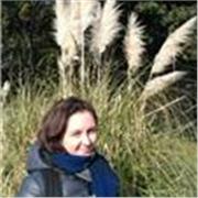 Englisch-Tutorin, die Englisch aller Altersgruppen unterrichtet (vor Ort und online) 