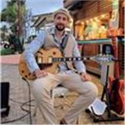 Insegnante di chitarra per diverse scuole su Torino ed in proprio, impartisce lezioni di chitarra Pop-Rock-Jazz-Blues-Funk online e in presenza