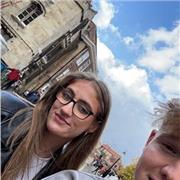 Native in English. Achieved top grades throughout education.