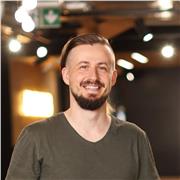 PhD in Computer Science offering personalized programming and computer science lessons for high school and university students.