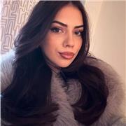 Friendly English teacher helping students improve speaking, reading, and confidence