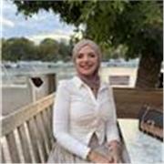 Friendly Secondary English Teacher Helping Students Build Confidence and Achieve Their Best
