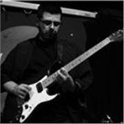 Profesor de guitarra clases particulares con opción a domicilio