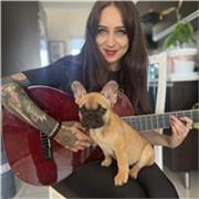 Passionate, patient guitar teacher for beginners, children, teens and adults.