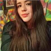 Profesora de Español que le enseña a niños, jóvenes y adultos