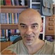 Economista y profesor de ajedrez y empresa experiencia