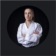 Olympic karate champion offering personalized lessons for beginners and competitive athletes, focused on  confidence and success.