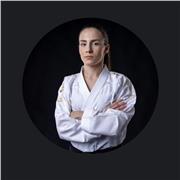 Olympic karate champion offering personalized lessons for beginners and competitive athletes, focused on confidence and success.