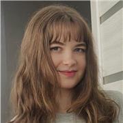 Friendly, patient teacher helping you speak English confidently.