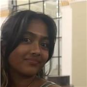 French tutor helping students prepare for their GCSEs and A-levels