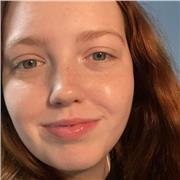 Friendly tutor helping children build confidence in maths and English