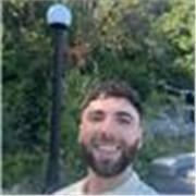 Friendly native English tutor helping adults communicate confidently.