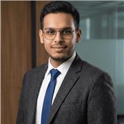 PhD scholar helping students achieve higher IELTS scores through clear strategies and confidence.