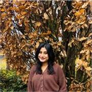 Friendly English Tutor Helping Young Kids Learn Through Fun Activities.