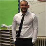 Experienced Computer Science HOD delivering private tutoring sessions