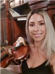 Profesora de Música, imparte clases de violín y Solfeo