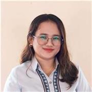 Friendly ESL tutor helping students improve speaking and confidence