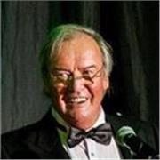 A television chef teaching with energy and enthusiasm to a wide ranging audience