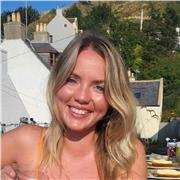 I would describe myself as a compassionate and results-driven professional with a deep commitment to empowering students to reach