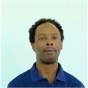 Patient, supportive teacher helping learners build confidence and fluency.