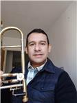 Profesor de música, con énfasis en instrumentos de viento metal (tuba, trompeta, barítono, trombón), solfeo, iniciación musical