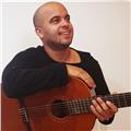 Doy clases de música, guitarra, tres cubano y otros. presenciales y online