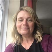 I am fluent in the English language and would love to help teach others