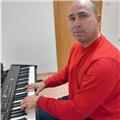 Profesor de piano, guitarra, iniciación musical, y armonía. abarcando desde música clásica hasta todos los géneros populares