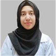 Maths tutor providing lessons to primary school students