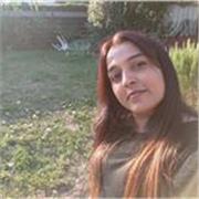 Private tutor teaching English to the students of primary and secondary level of students