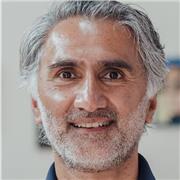 calm, patient, organised, empathetic person who sets clear goals, follows up, and supports others to reach their own conclusions.