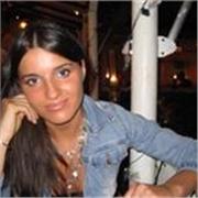 Docente italiana impartisce lezioni di italiano a stranieri in lingua inglese