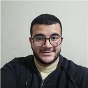 I would describe myself as a patient, structured, and practical programming tutor who focuses on helping learners truly understand