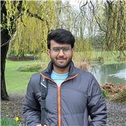 Programmer teaching the basics of programming to children of all age