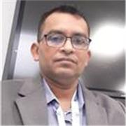 Computer science teacher providing lessons for secondary level students