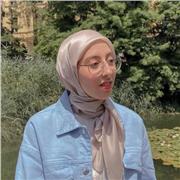 English IELTS tutor teaching students of all ages