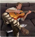 Chitarrista con esperienza trentennale offre lezioni private di chitarra moderna