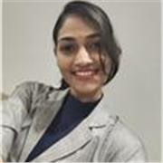 Friendly teacher helping students improve speaking, reading, writing, and grammar through simple student-friendly lessons